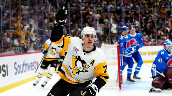 Mar 16, 2026; Denver, Colorado, USA; Pittsburgh Penguins center Evgeni Malkin (71) reacts after his goal in the first period against the Colorado Avalanche at Ball Arena. Mandatory Credit: Ron Chenoy-Imagn Images