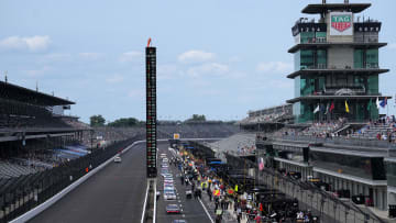 Cars leave pit road prior to the start of the Pennzoil 250, Saturday, July 20, 2024, at Indianapolis Motor Speedway.