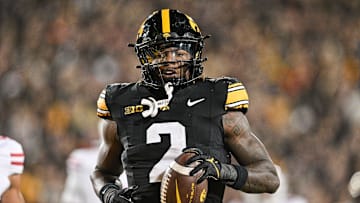 Iowa Hawkeyes running back Kaleb Johnson (2) runs for a 16 yard touchdown against the Wisconsin Badgers during the second quarter at Kinnick Stadium. 