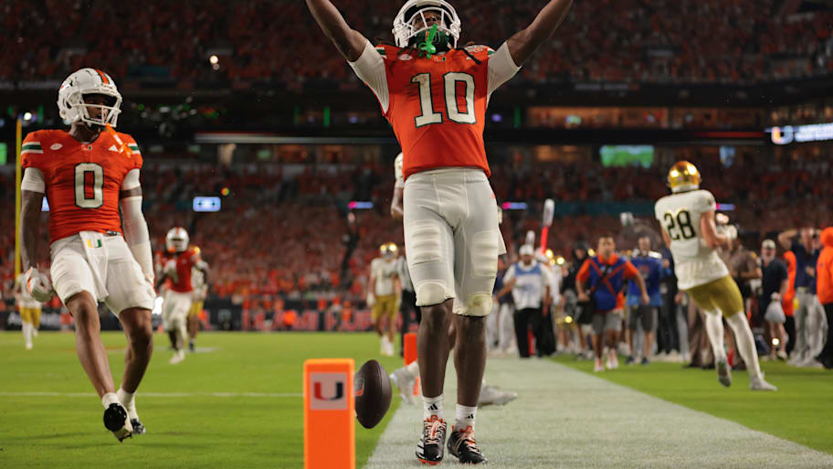 Hurricanes wide receiver Malachi Toney celebrates after scoring a touchdown against Notre Dame to open the season.