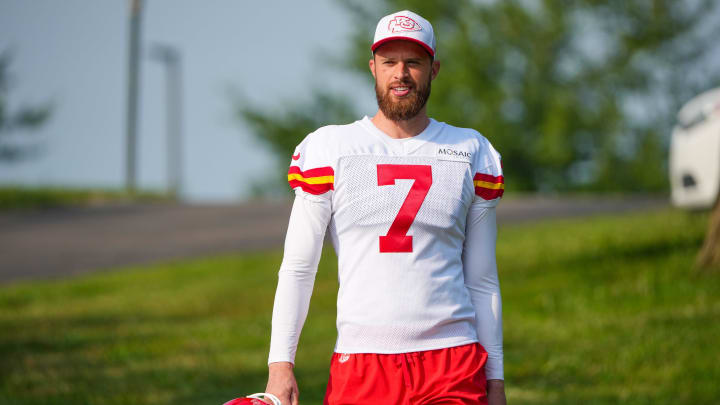 Jul 22, 2024; St. Joseph, MO, USA; Kansas City Chiefs kicker Harrison Butker (7) walks down the hill from the locker room to the fields prior to training camp at Missouri Western State University. Mandatory Credit: Denny Medley-USA TODAY Sports