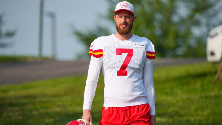 Jul 22, 2024; St. Joseph, MO, USA; Kansas City Chiefs kicker Harrison Butker (7) walks down the hill from the locker room to the fields prior to training camp at Missouri Western State University. Mandatory Credit: Denny Medley-USA TODAY Sports