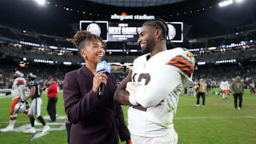 Nov 23, 2025; Paradise, Nevada, USA; CBS Sports reporter Tiffany Blackman (left) interviews Cleveland Browns quarterback Shedeur Sanders (12) after the game against the Las Vegas Raiders at Allegiant Stadium. Mandatory Credit: Kirby Lee-Imagn Images