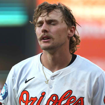 Jun 27, 2024; Baltimore, Maryland, USA; Baltimore Orioles shortstop Gunnar Henderson (2) reacts after grounding out in the fourth inning against the Texas Rangers at Oriole Park at Camden Yards.