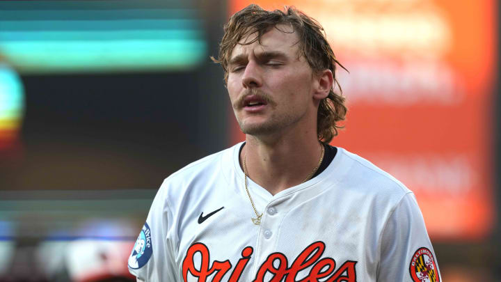 Jun 27, 2024; Baltimore, Maryland, USA; Baltimore Orioles shortstop Gunnar Henderson (2) reacts after grounding out in the fourth inning against the Texas Rangers at Oriole Park at Camden Yards.