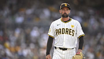 Aug 21, 2024; San Diego, California, USA; San Diego Padres starting pitcher Matt Waldron (61) walks to the dugout during the fourth inning against the Minnesota Twins at Petco Park. Mandatory Credit: Orlando Ramirez-Imagn Images