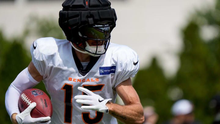 Cincinnati Bengals wide receiver Charlie Jones (15) runs with a catch during a preseason training camp practice at the Paycor Stadium practice field in downtown Cincinnati on Wednesday, Aug. 7, 2024.