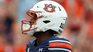 One Auburn University professor is not happy with the athletic department's handling of Malcolm Simmons' DV arrest