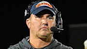 Union (Virginia) Bears football coach Travis Turner is officially listed as a wanted fugitive after disappearing from his home late last week prior to police arriving to question him. The former All-American is now charged with five counts of possessing child sexual abuse material and five counts of using a computer to solicit minors with more charges possible.