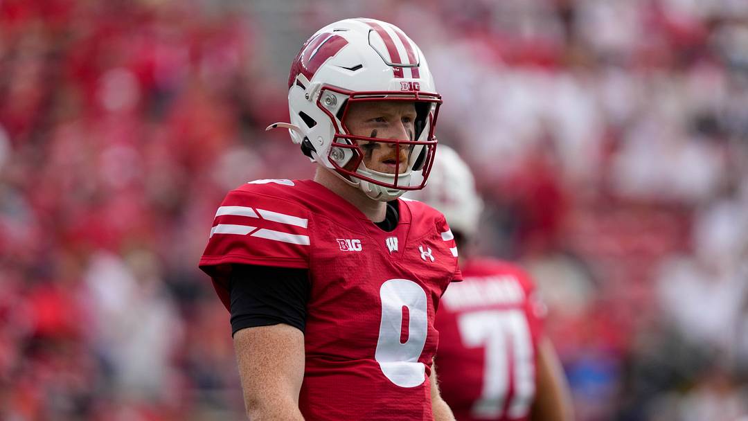 Sep 20, 2025; Madison, Wisconsin, USA;  Wisconsin Badgers quarterback Billy Edwards Jr. (9) looks to the sidelines between plays during the game against the Maryland Terrapins at Camp Randall Stadium. Mandatory Credit: Jeff Hanisch-Imagn Images