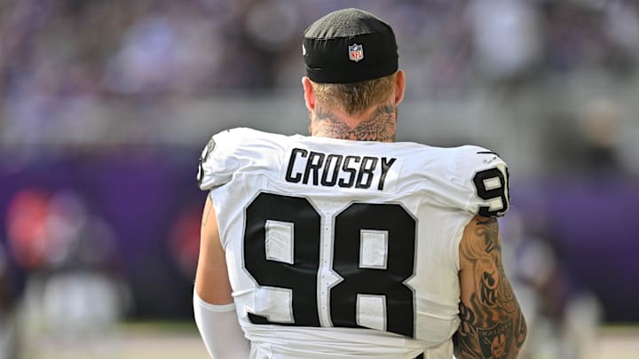 Aug 10, 2024; Minneapolis, Minnesota, USA; Las Vegas Raiders defensive end Maxx Crosby (98) looks on during the game against the Minnesota Vikings at U.S. Bank Stadium. Mandatory Credit: Jeffrey Becker-Imagn Images