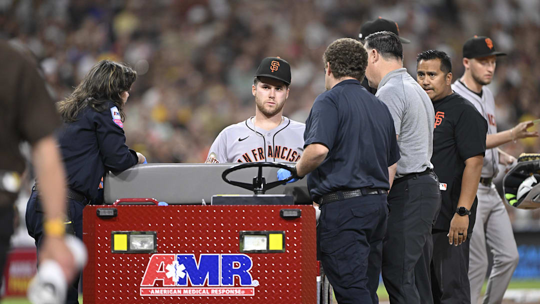 Aug 20, 2025; San Diego, California, USA; San Francisco Giants starting pitcher Landen Roupp (65) sits in a cart after being hit by a ball hit by San Diego Padres right fielder Ramon Laureano (5) during the third inning at Petco Park. Mandatory Credit: Denis Poroy-Imagn Images Aug 20, 2025; San Diego, California, USA; San Francisco Giants starting pitcher Landen Roupp (65) sits in a cart after being hit by a ball hit by San Diego Padres right fielder Ramon Laureano (5) during the third inning at Petco Park. Mandatory Credit: Denis Poroy-Imagn Images