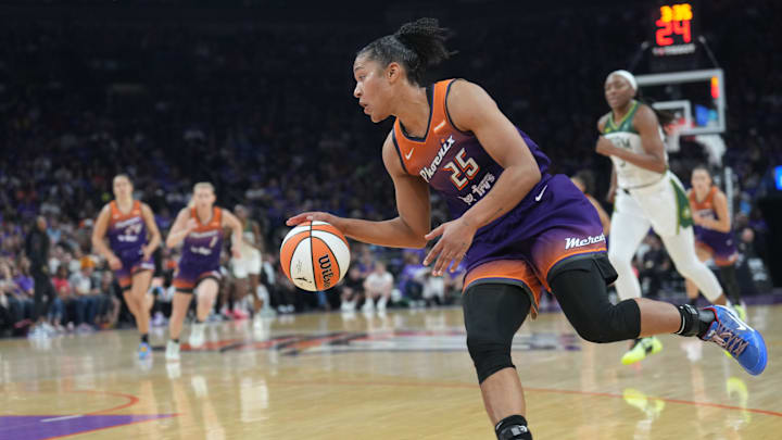 May 17, 2025; Phoenix, Arizona, USA; Phoenix Mercury forward Alyssa Thomas (25) dribbles against the Seattle Storm during the second half at Footprint Center. Mandatory Credit: Joe Camporeale-Imagn Images