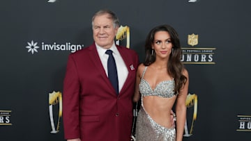 Bill Belichick and Jordon Hudson on the red carpet before Super Bowl LIX NFL Honors at Saenger Theatre 