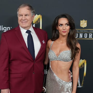 Bill Belichick and Jordon Hudson on the red carpet before Super Bowl LIX NFL Honors.