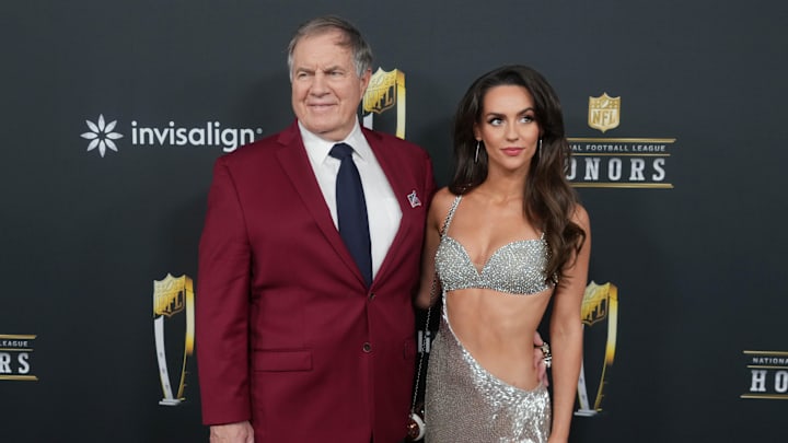 Bill Belichick and Jordon Hudson on the red carpet before Super Bowl LIX NFL Honors.