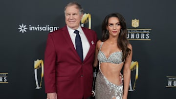 Bill Belichick and Jordon Hudson on the red carpet before Super Bowl LIX NFL Honors at Saenger Theatre. 