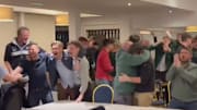 Members from Rory McIlroy's home club revel in his victory.