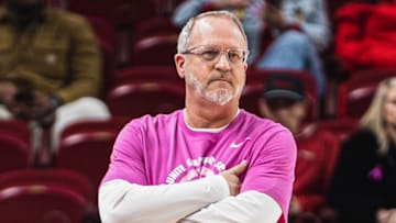 Arkansas coach Mike Neighbors reacts on the sideline against Ole Miss. The Rebels won 89-50.
