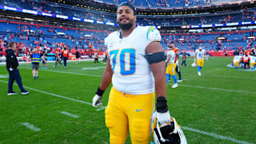 Los Angeles Chargers offensive tackle Rashawn Slater (70) following the win over the Denver Broncos at Empower Field at Mile High. Mandatory Credit: Ron Chenoy-Imagn Images