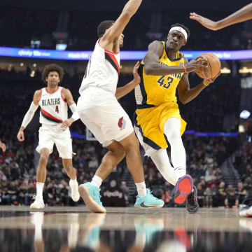 Jan 19, 2024; Portland, Oregon, USA; Indiana Pacers power forward Pascal Siakam (43) drives to the basket against Portland Trail Blazers point guard Malcolm Brogdon (11) during the first half at Moda Center. Mandatory Credit: Soobum Im-USA TODAY Sports