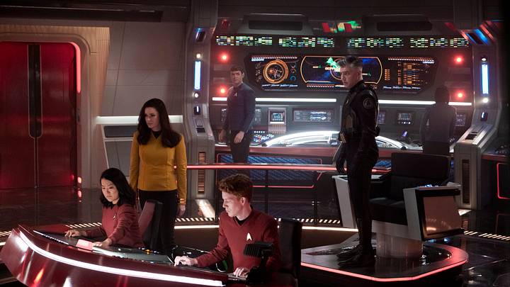 L-R Rong Fu as Mitchell, Rebecca Romijn as Una, Ethan Peck as Spock and Anson Mount as Capt. Pike in Star Trek: Strange New Worlds streaming on Paramount+, 2023. Photo Credit: Michael Gibson/Paramount+