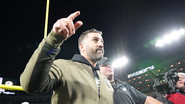 Philadelphia Eagles head coach Nick Sirianni leaves the field after beating the Green Bay Packers.