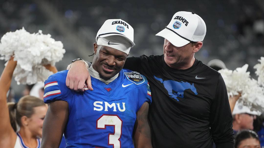 SMU Mustangs safety Ahmaad Moses and head coach Rhett Lashlee celebrate after victory over the Arizona Wildcats in the Holiday Bowl at Snapdragon Stadium. Picture by: Kirby Lee-Imagn Images SMU Mustangs safety Ahmaad Moses and head coach Rhett Lashlee celebrate after victory over the Arizona Wildcats in the Holiday Bowl at Snapdragon Stadium. Picture by: Kirby Lee-Imagn Images