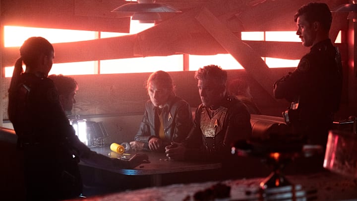 L-R Melanie Scrofano as Batel, Anson Mount as Capt. Pike and Dan Jeannotte as Sam Kirk in Star Trek: Strange New Worlds streaming on Paramount+, 2023. Photo Credit: Michael Gibson/Paramount+