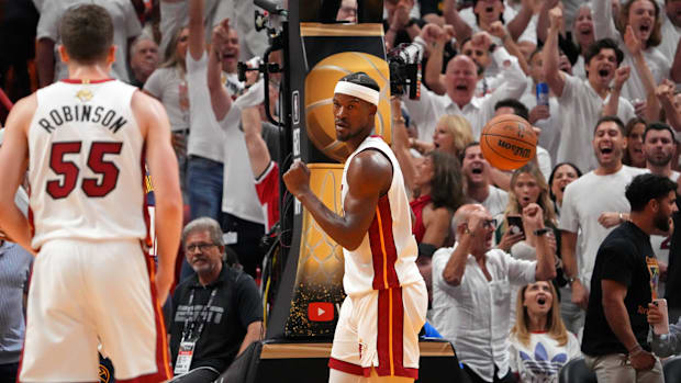 Miami Heat striker Jimmy Butler reacts after a game against the Denver Nuggets.