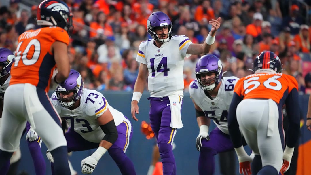 Former Minnesota Vikings quarterback Sean Mannion (14) in the first quarter against the Denver Broncos at Empower Field at Mile High.