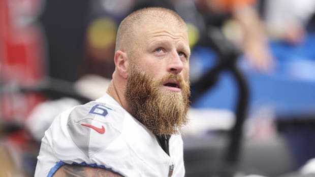 Tennessee Titans kicker Joey Slye looks up from the bench