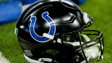 A black Indianapolis Colts helmet sits on the turf Sunday, Nov. 24, 2024, during a game against the Detroit Lions at Lucas Oil Stadium in Indianapolis.