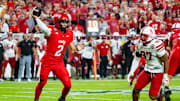 Aug 28, 2025; Kansas City, Missouri, USA; Cincinnati Bearcats quarterback Brendan Sorsby (2) passes against Nebraska Cornhuskers defensive lineman Keona Davis (97) during the second quarter at GEHA Field at Arrowhead Stadium. Mandatory Credit: Dylan Widger-Imagn Images