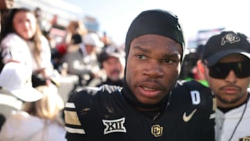 Travis Hunter exits the field with his team after crushing Oklahoma State.