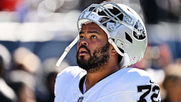 Oct 22, 2023; Chicago, Illinois, USA;  Las Vegas Raiders guard Jermaine Eluemunor (72) heads to the locker room after warming up before a game against the Chicago Bears at Soldier Field. Mandatory Credit: Jamie Sabau-USA TODAY Sports