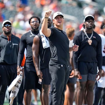 Cincinnati Bengals defensive end Trey Hendrickson (91) watches a replay in the fourth quarter of the NFL Preseason Week 3 game between the Cincinnati Bengals and the Indianapolis Colts at Paycor Stadium in Cincinnati on Saturday, Aug. 23, 2025. The Colts won 41-14.