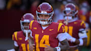 Oct 11, 2025; Los Angeles, California, USA; USC Trojans quarterback Jayden Maiava (14) heads on to the field for the game against the Michigan Wolverines at United Airlines Field at the Los Angeles Memorial Coliseum. Mandatory Credit: Jayne Kamin-Oncea-Imagn Images