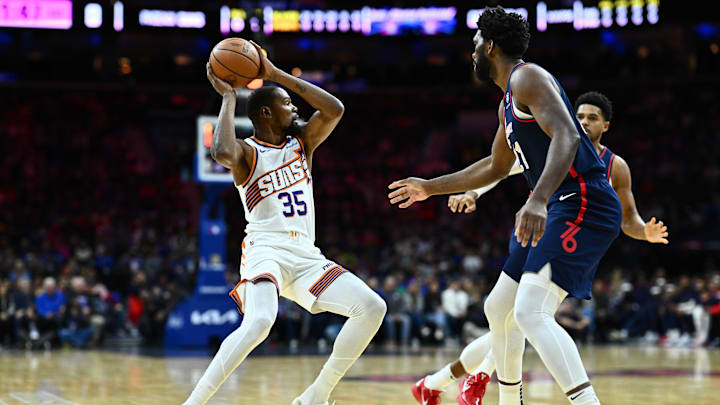 Nov 4, 2023; Philadelphia, Pennsylvania, USA; Phoenix Suns forward Kevin Durant (35) controls the ball against Philadelphia 76ers center Joel Embiid (21) in the first quarter at Wells Fargo Center. Mandatory Credit: Kyle Ross-Imagn Images