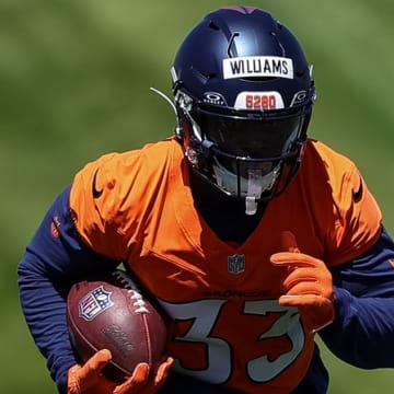 Denver Broncos running back Javonte Williams (33) during organized team activities at Centura Health Training Center. 