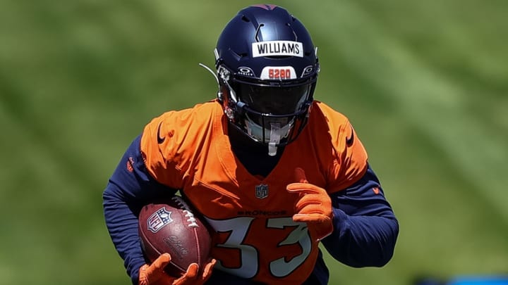 Denver Broncos running back Javonte Williams (33) during organized team activities at Centura Health Training Center. 