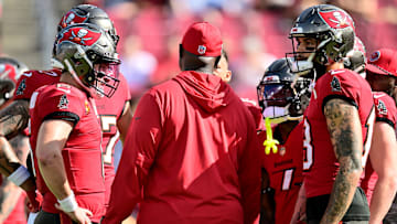 Tampa Bay Buccaneers QB Baker Mayfield, WR Mike Evans, and HC Todd Bowles.