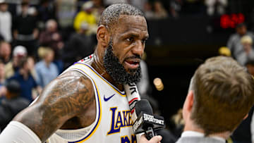 Dec 1, 2024; Salt Lake City, Utah, USA; Los Angeles Lakers forward LeBron James (23) gets interviewed after the game against the Utah Jazz at the Delta Center.