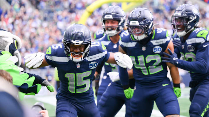 Seahawks receiver Tory Horton (15) celebrates after scoring a 95 yard punt return for a touchdown against the Saints