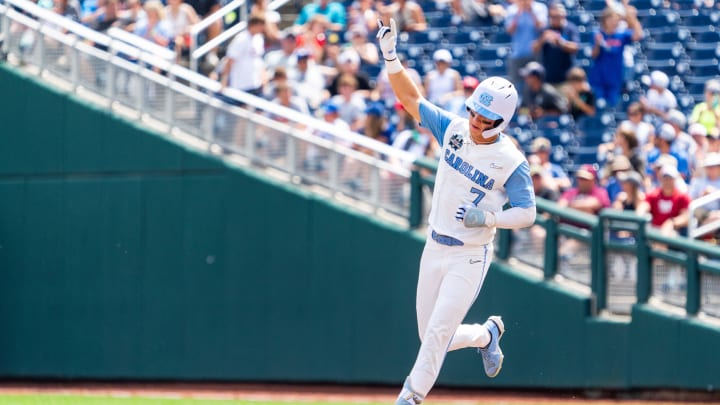 Jun 18, 2024; Omaha, NE, USA; North Carolina Tar Heels center fielder Vance Honeycutt (7) celebrates after hitting a three-run home run against the Florida State Seminoles during the fifth inning at Charles Schwab Field Omaha. Mandatory Credit: Dylan Widger-USA TODAY Sports