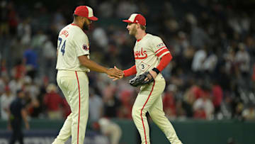 Sep 24, 2025; Anaheim, California, USA;  Los Angeles Angels left fielder Taylor Ward (3) congratulates relief pitcher Kenley Jansen (74) after his 28th save of the season in the ninth inning against the Kansas City Royals at Angel Stadium. Mandatory Credit: Jayne Kamin-Oncea-Imagn Images