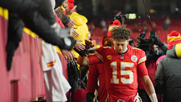 Jan 18, 2025; Kansas City, Missouri, USA; Kansas City Chiefs quarterback Patrick Mahomes (15) shakes hands with fans after defeating the Houston Texans in a 2025 AFC divisional round game at GEHA Field at Arrowhead Stadium. Mandatory Credit: Jay Biggerstaff-Imagn Images