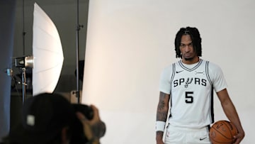 Sep 29, 2025; San Antonio, TX, USA; San Antonio Spurs guard Stephon Castle (5) poses for photos during Media Day at Victory Capital Performance Center in San Antonio. Mandatory Credit: Scott Wachter-Imagn Images
