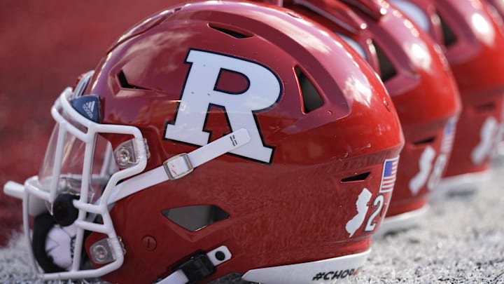 Oct 7, 2023; Madison, Wisconsin, USA; Rutgers Scarlet Knights football helmets sit on the field during warmups prior to the game against the Wisconsin Badgers at Camp Randall Stadium. Mandatory Credit: Jeff Hanisch-Imagn Images Oct 7, 2023; Madison, Wisconsin, USA; Rutgers Scarlet Knights football helmets sit on the field during warmups prior to the game against the Wisconsin Badgers at Camp Randall Stadium. Mandatory Credit: Jeff Hanisch-Imagn Images