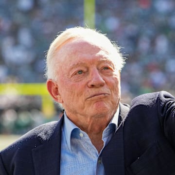 Dallas Cowboys owner Jerry Jones stands on the field before a game against the New York Jets at MetLife Stadium. 